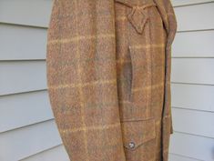 "Allen Mfg. Co. - Denver, Colo. wool, and/or chopped fur, mohair approx. Size 36 - 38 Long(please rely on measurements) 1950's Incredible coat...I don't think the images do it justice. Allen Mfg. of Denver, Colorado...\"Western Made for the Westerner\". Brindled Brown, Olive, Gold, & Red in a large scale windowpane plaid comprised of Gold & Green stripes. I don't have much info on Allen, but eveyrthing I have seen from them is awesome...this jacket is no exception. Super soft, long pile, Mens Vintage Western Style, Vintage Brown Wool Coat, Vintage Pendleton Jacket, Men’s Vintage Western Wear, Vintage Pendleton Wool Blazer, Vintage Plaid Outerwear With Pockets, Windowpane Plaid, 1950s Mens, Jacquard Weave