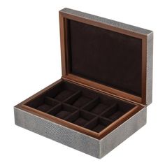 an open leather watch box with twelve watches inside on a white background, viewed from the front