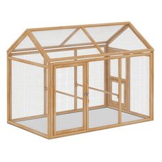 a small wooden chicken coop with two doors