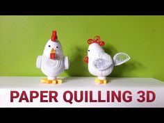 two paper chickens sitting on top of a white shelf with the words paper quilling 3d