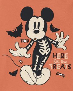 a mickey mouse halloween shirt with the words here for the treats written in black on an orange background