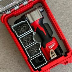 a red tool box with tools in it