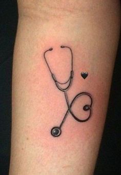 a tattoo with a stethoscope on the arm