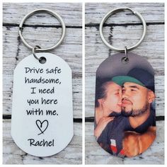 two key chains that have pictures on them and one has an image of a couple