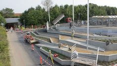 construction workers are working on the new skate park