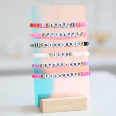 💫 Wholesale discount 🚀 Worldwide Shipping (3-5 days) 📐 Customization available (DM us)  Our Bracelet Display Stand SWIFTIE is perfect for friendship bracelets.  Perfect for retail, pop-up events, or professional showcases. Designed for clean, organized, and stylish presentations, it's perfect for showcasing friendship bracelets inspired by Swiftie culture.  Ideal for Displays: Perfect for shops, events, or collectors looking to create an eye-catching arrangement. Dimensions :  - Acrylic : 17x Swiftie Bracelet, Bracelet Display Stand, Inspired Bracelets, Jewellery Displays, Bracelet Holder, Bracelet Holders, Bracelet Display, Pop Up Event, Wood Acrylic