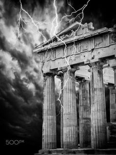 lightning strikes over the part of an ancient greek temple