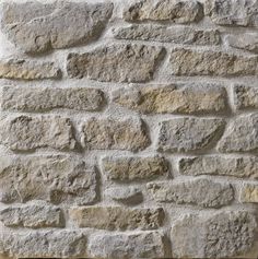 an old brick wall is shown in this image