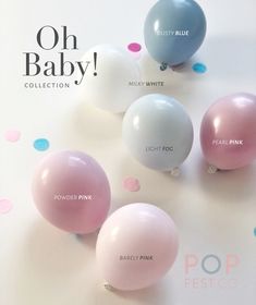 balloons with the words oh baby written on them in pink, blue, and white