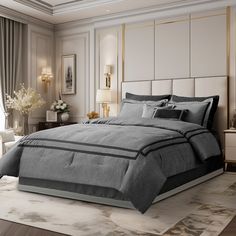 a large bed in a room with white walls