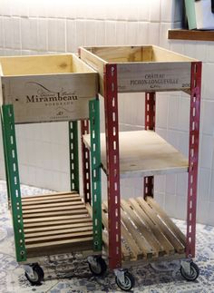 two wooden crates sitting on top of a tiled floor