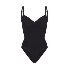 Our viral sculpting bodysuit, updated for an even better fit. This figure-enhancing style has extra compression at the core and waist, perfectly-placed style lines that flatter your bust, and rounded butt pockets for a lifted look. Features adjustable straps, a wide crotch for added coverage, and a cotton gusset with snap closure. Fits true to size. | SKIMS Brief Bodysuit | Black | Seamless Sculpt Sculpting Bodysuit, Body Suit Outfits, Shapewear Bodysuit, Birthday List, Black Bodysuit, Body Suit, Kim Kardashian, Shapewear, Onyx