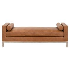 a tan leather couch with two arms and legs