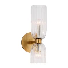 A contemporary interpretation of French Mid-Century design, this double sconce is crafted from two cup-shaped glass lights with a ribbed finish and is attached to a circular wall plate. It is ideal for any space requiring ample lighting, from hallways to bathrooms. Height: 16" Width: 6" Extension: 7.5" Backplate: 5.5" round Socket: 2 - E12 candelabra Wattage: 2 - 5.5 LED G16.5 UL only | AERIN Visual Comfort ARN 2500HAB-CG Asalea 16" Double Bath Sconce in Clear Glass/Antique Brass size 16" x 6" | Elegant Bath, Double Bath, Circa Lighting, Bathroom Wall Sconces, Modern Wall Sconces, Large Mirror, Glass Lighting, Edison Light Bulbs, Visual Comfort