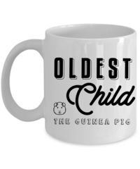 a white coffee mug with the words oldest child in black on it and an image of a