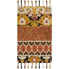 an orange and black rug with tassels on the bottom, in different colors