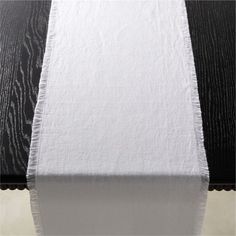 an image of a white and black table runner