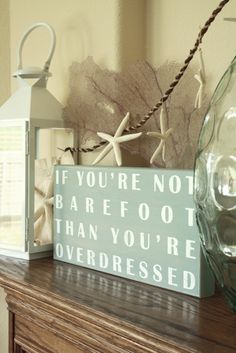 a wooden sign that says if you're not barefoot, than you're overdressed