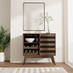 a wooden cabinet with wine bottles and bowls on it in front of a potted plant