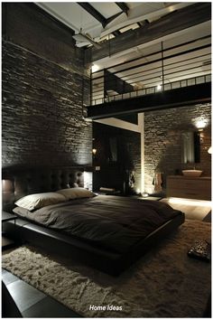 a large bed sitting in the middle of a bedroom next to a loft style ceiling