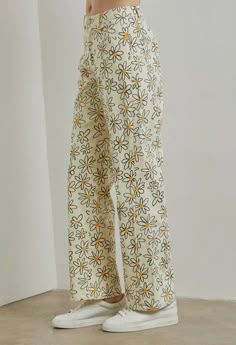 60% Cotton, 37% Polyester and 3% Spandex Pants Floral Print, Trendy Cheap Floral Print Bottoms, Chic Floral Print Bottoms, Affordable Printed Summer Bottoms, Trendy Spring Bottoms At Affordable Prices, Tan Patterned Jeans, Cheap Floral Print Bottoms For Fall, Affordable Floral Print Trousers, Cheap Relaxed Fit Pants With Floral Print