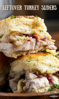 two turkey sliders stacked on top of each other in a bowl with text overlay