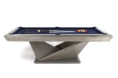 a pool table with two billiards and cues on the top, against a white background