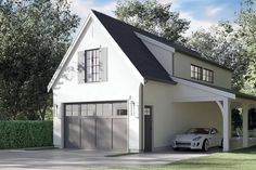 a white car is parked in front of a two - story garage with an attached porch