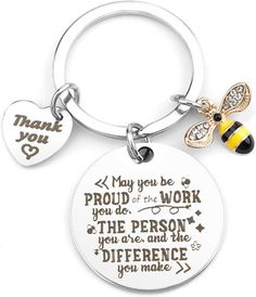 a keychain with a bee on it that says, may you be proud of the work you do