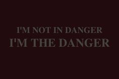 the words i'm not in danger, i'm the danger on a black background