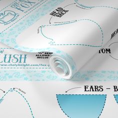 a roll of blue and white paper on top of each other with the words lush printed on it