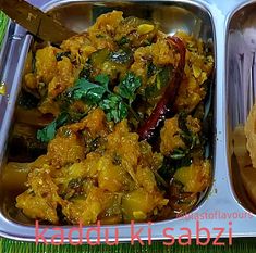 two metal trays filled with different types of food