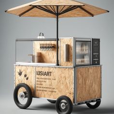 an ice cream cart with a wooden structure and umbrella on the top that says usaart