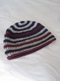 "This is a blue, burgundy and beige spiral/striped design crochet wool winter hat. Handmade in 100% wool it is 8\" tall and 20\" around. Hand wash, pat dry, reshape and dry flat. Do not wring!" Burgundy And Beige, Design Crochet, Crochet Wool, Hat Handmade, Wool Winter, Crochet Beanie, Skull Cap Beanie, Winter Hat, Skull Cap