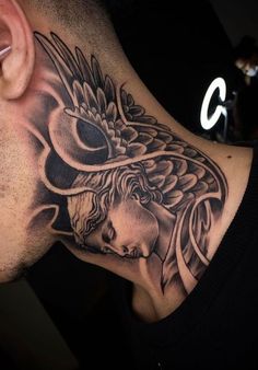 a man with a tattoo on his neck and behind him is a bird, which has a woman's head in the center