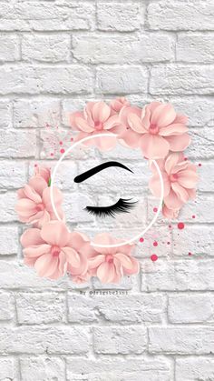 a brick wall with pink flowers around it and an image of a eyelashes in the middle