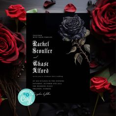 a black and red wedding card with roses