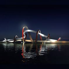 an artistic sculpture in the water at night