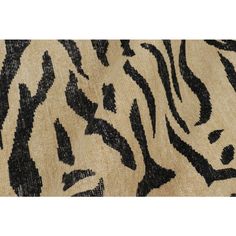 an animal print fabric with black and white stripes