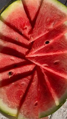 a watermelon cut in half on a plate