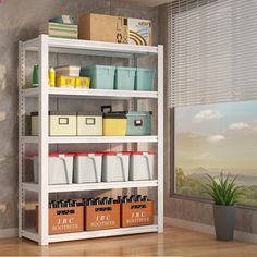 a white shelving unit with bins and boxes on it next to a window