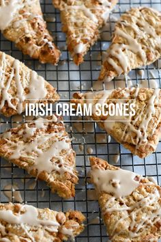 several scones with icing on a cooling rack