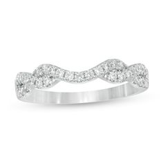 a white gold wedding band with diamonds