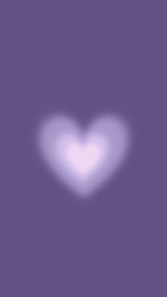 a white heart on a purple background