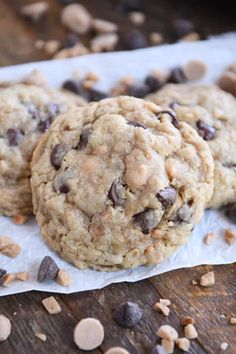 two cookies with chocolate chips on a napkin