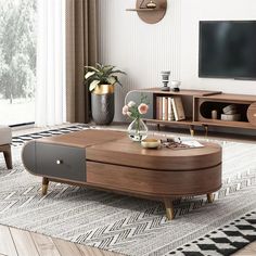 a living room scene with focus on the coffee table and entertainment center in the background