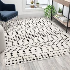 a white and black rug in a living room