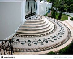 the stairs are decorated with black and white designs