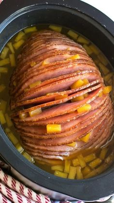 a pot filled with food sitting on top of a table