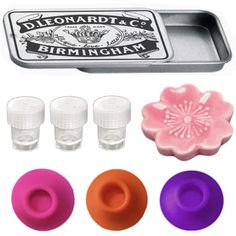 an assortment of different colored plastic cups and trays with the lid open to show it's contents